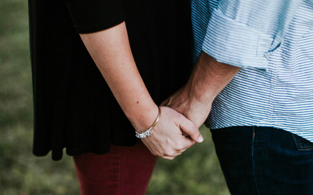 couple in a relationship holding hands